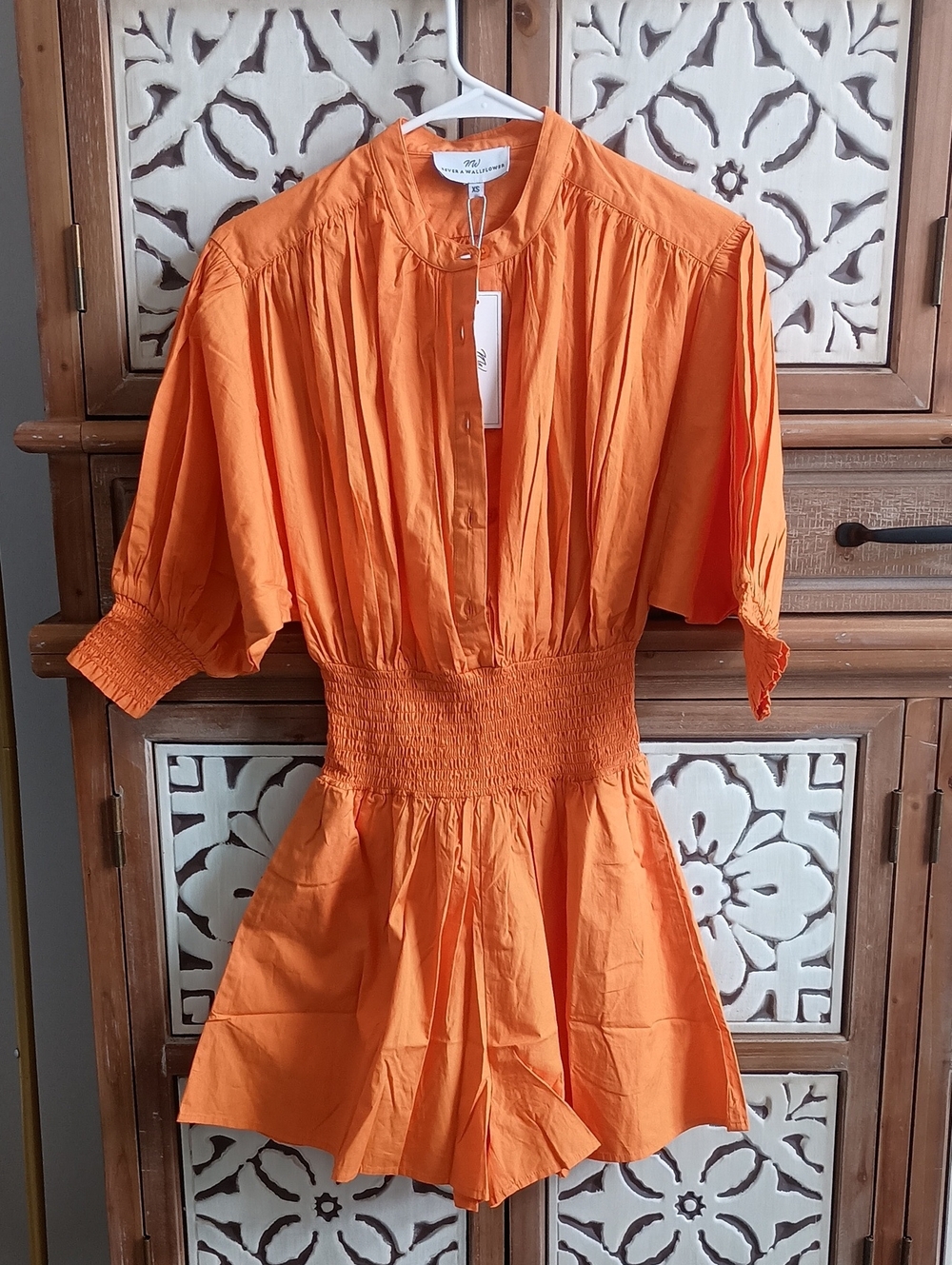 Never A Wallflower Bright Orange Smocked Waist Romper